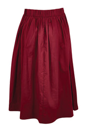Product shot of the Cotton Blend Midi Skirt – Burgundy in colour Burgundy, from the back