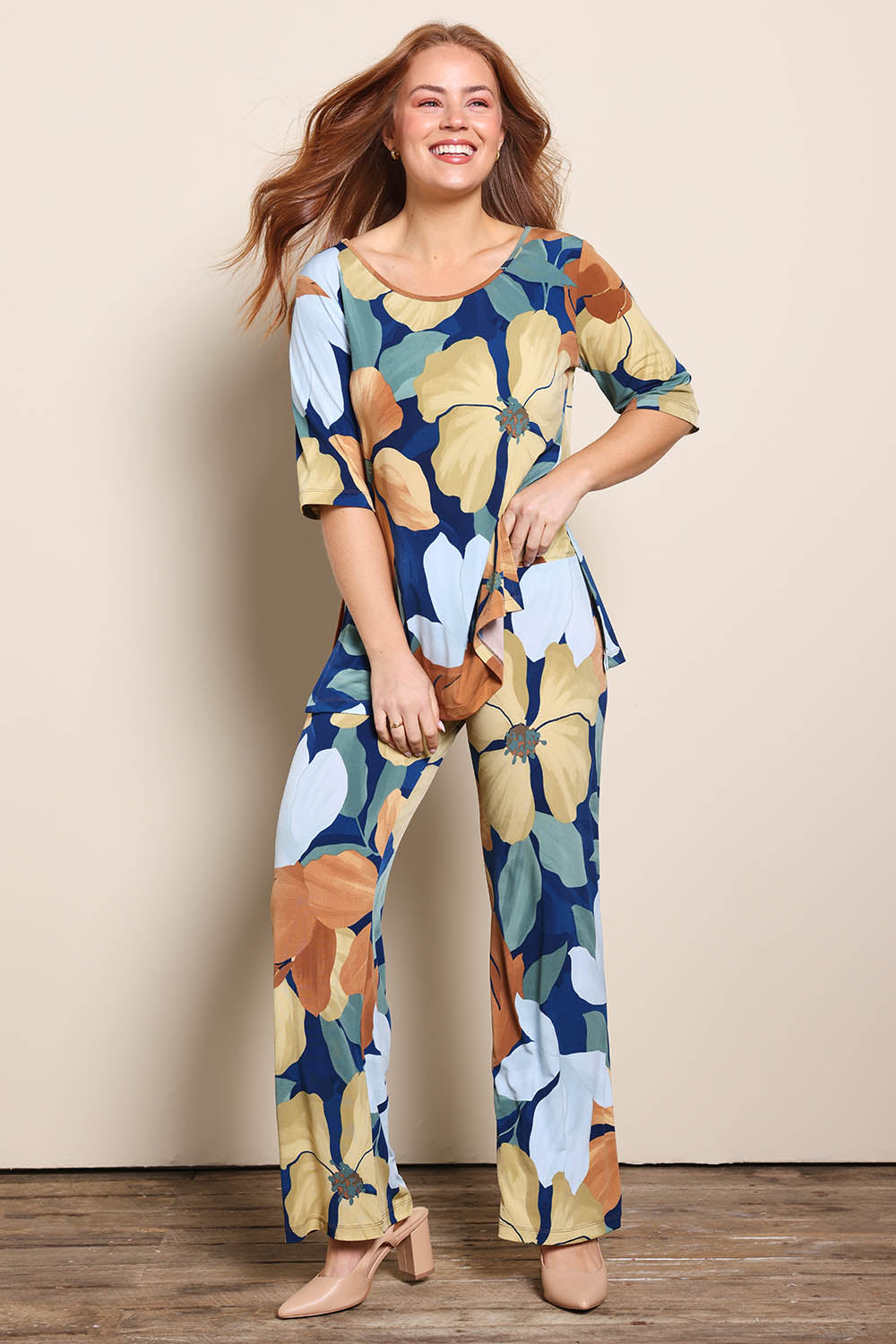 Model Georgiel wearing size 10 of the Side Split Tunic Top – Amberflora in colour Amberflora, from the front