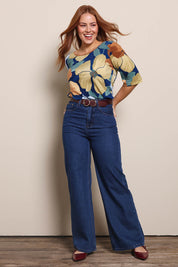 Model Georgiel wearing size 10 of the Side Split Tunic Top – Amberflora in colour Amberflora, from the front