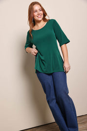 Model Georgiel wearing size 10 of the Side Split Tunic Top – Posygreen in colour Posygreen, from the front