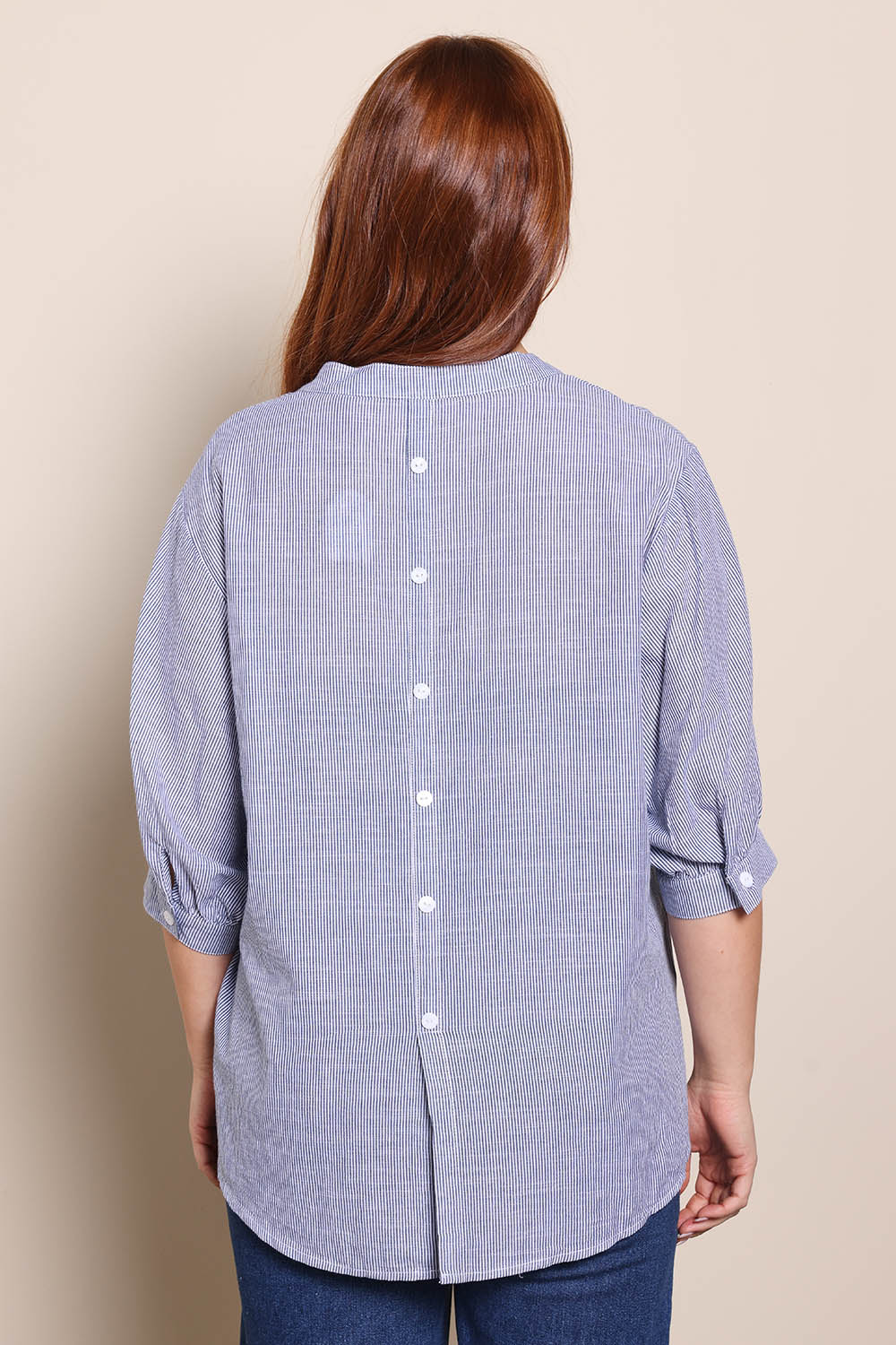 Model Georgiel wearing size 10 of the Cotton Button Down Stripe Blouse – Slate in colour Slate, from the back