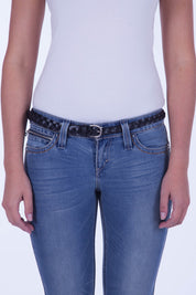 A model wearing the Carol Genuine Leather Belt in colour Black (Black), from the front, cropped image
