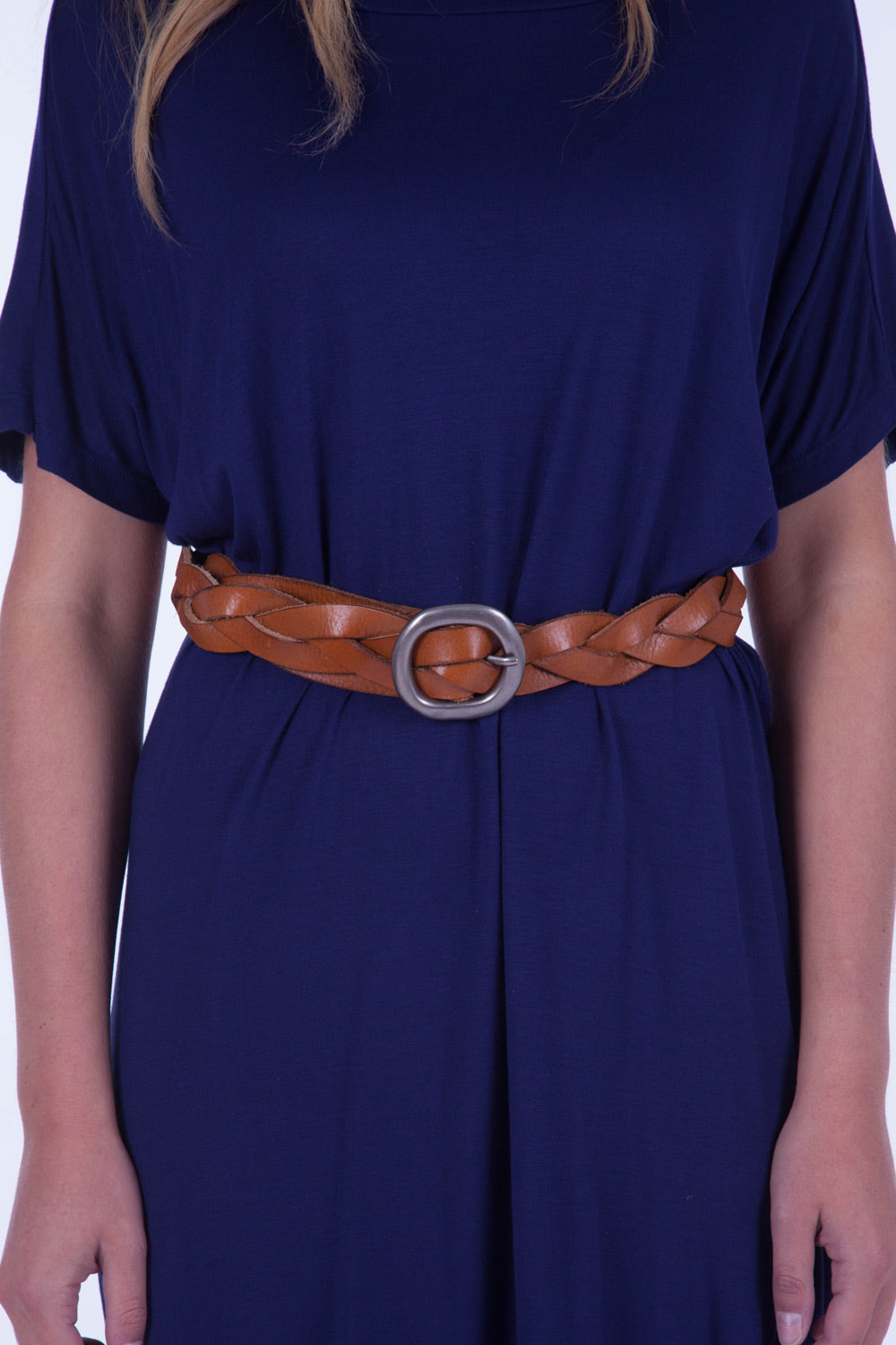 A model wearing the Louise Genuine Leather Belt in colour Tan, from the front, cropped image