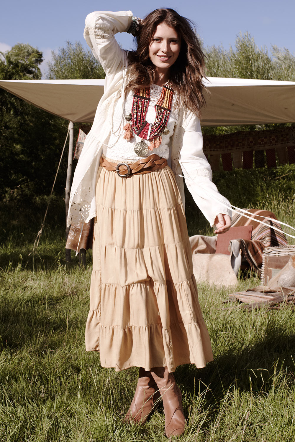 A model wearing the Louise Genuine Leather Belt in colour Tan, from the front, showing the whole outfit