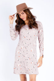Model Ilona wearing size S of the Dropped Flounce Dress in colour Petals, from the front, cropped image