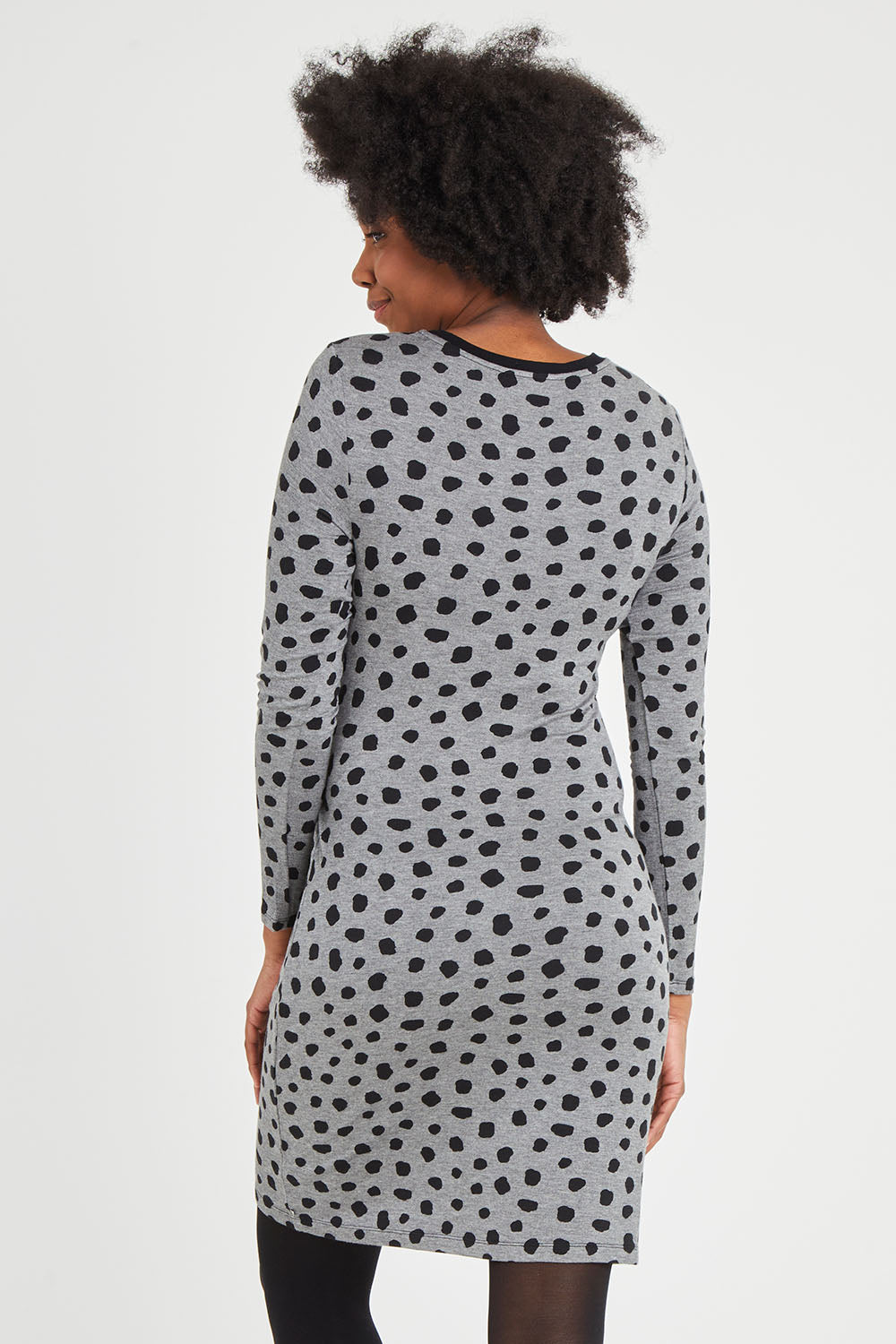 Model Aiyana wearing size S of the Wrap Dress in colour Dots (Grey), from the back
