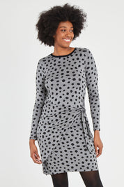 Model Aiyana wearing size S of the Wrap Dress in colour Dots (Grey), from the front, cropped image