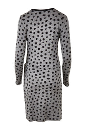 Product shot of the Wrap Dress in colour Dots (Grey), from the back