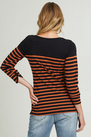 Model Grace wearing size S of the 3/4 Sleeve Breton in colour Amberstrip (Black), from the back