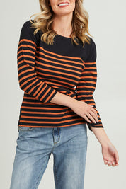 Model Grace wearing size S of the 3/4 Sleeve Breton in colour Amberstrip (Black), from the front, cropped image