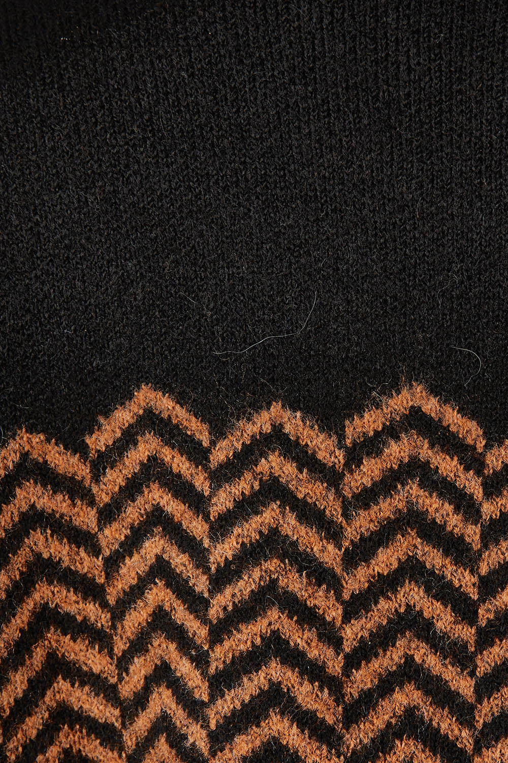 Product shot of the Mock Neck Tunic in colour Herrbone, detail
