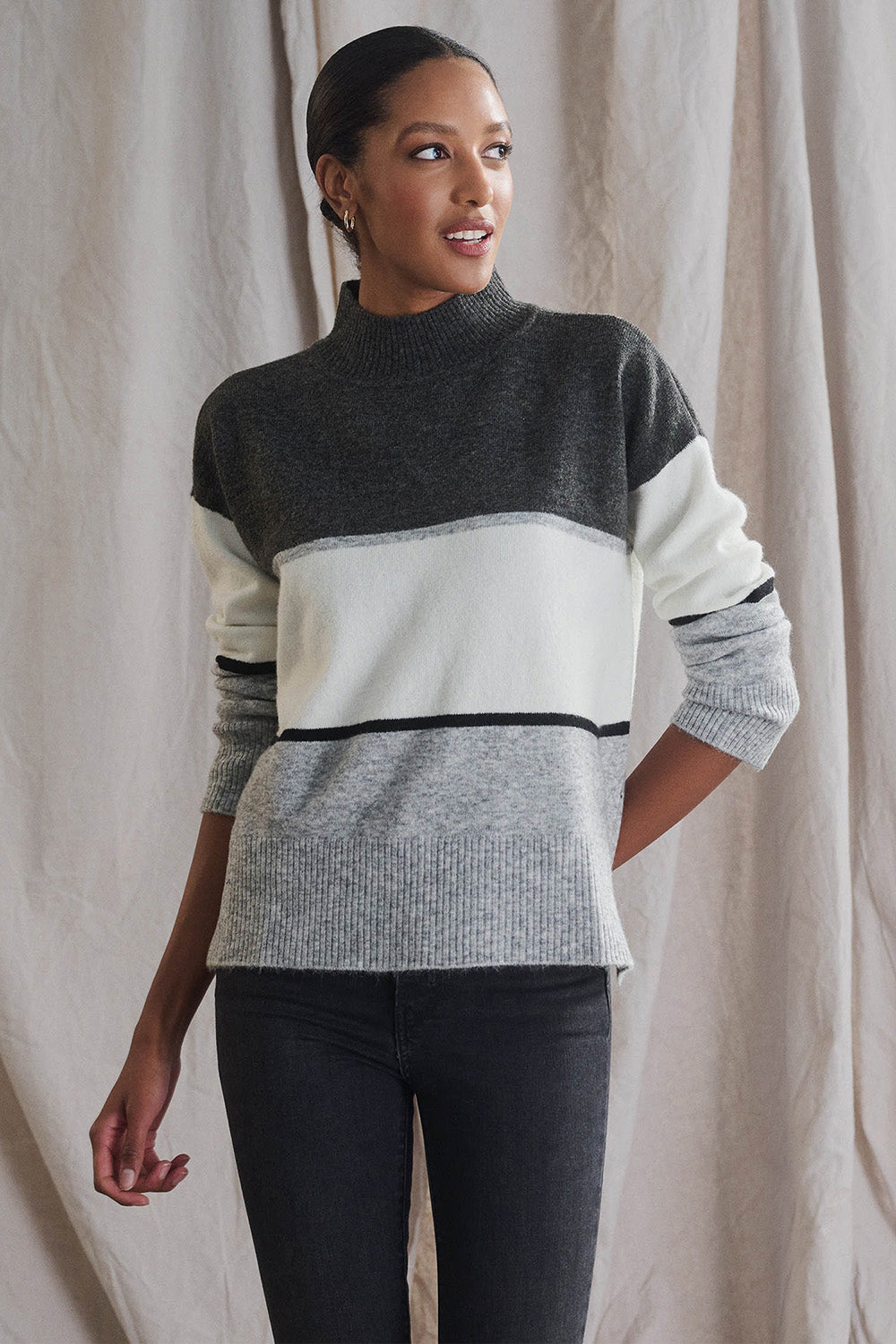 A model wearing the Mock Neck Tunic in colour Grey (Grey), from the front, cropped image