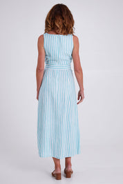 Model Emma wearing size S of the Isla Maxi Dress in colour Turquoise (Green), from the back