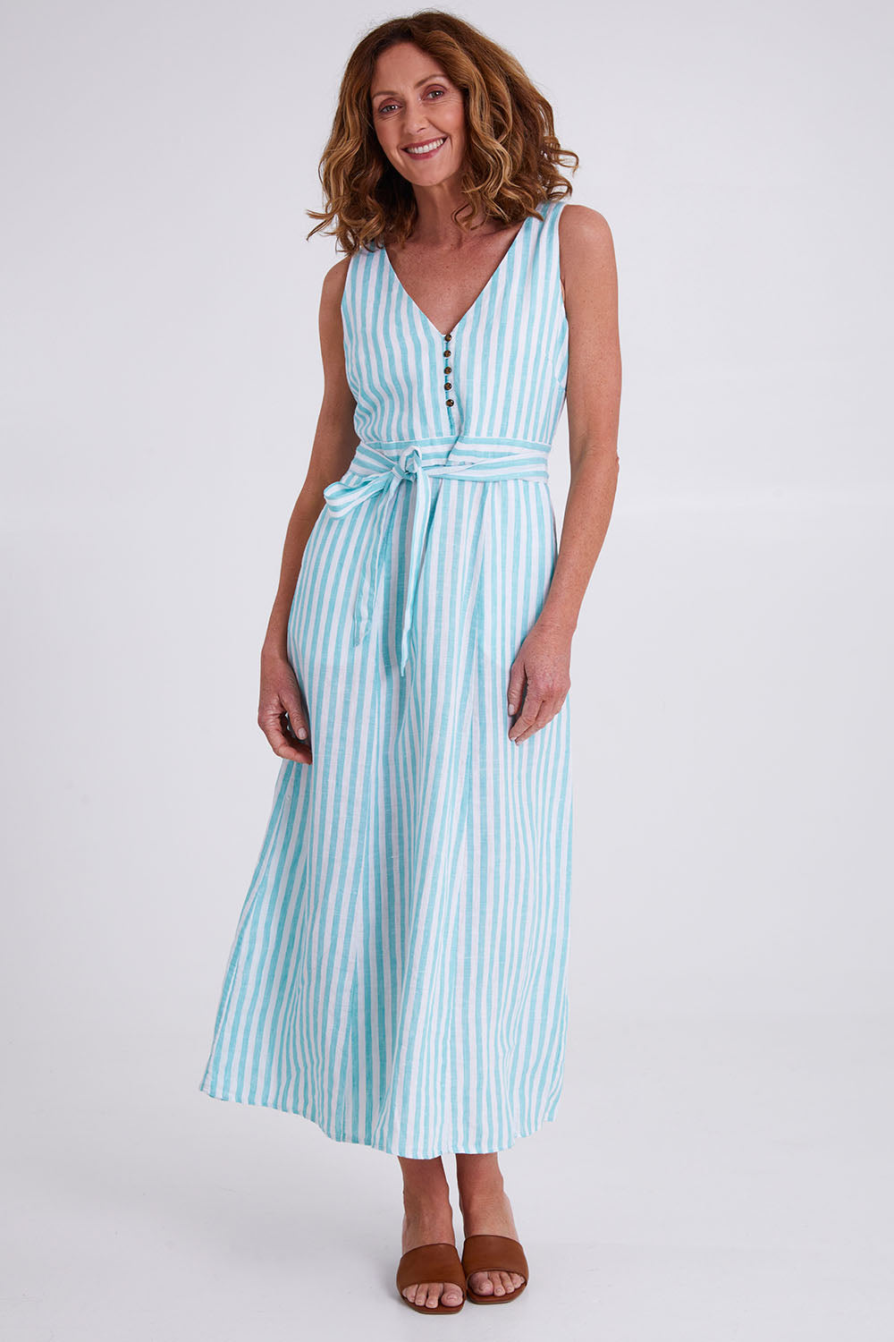 Model Emma wearing size S of the Isla Maxi Dress in colour Turquoise (Green), from the front, showing the whole outfit