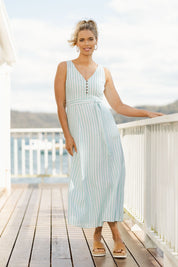 Model Phoebe wearing size S of the Isla Maxi Dress in colour Turquoise (Green), from the front, showing the whole outfit