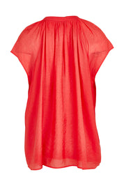 Product shot of the Baja Top in colour Punch (Red), from the back