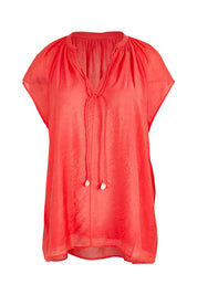 Product shot of the Baja Top in colour Punch (Red), from the front