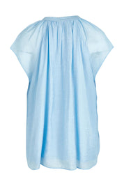 Product shot of the Baja Top in colour Safira (Blue), from the back