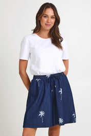 Model Madeline wearing size S of the Montego Denim Short in colour Indigo (Blue), from the front, cropped image