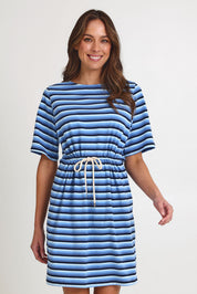 Model Madeline wearing size S of the Limon Stripe Cotton Tshirt Dress in colour Indigo (Blue), from the front, cropped image
