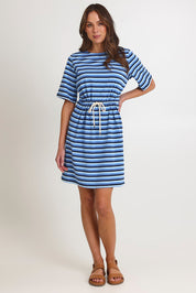 Model Madeline wearing size S of the Limon Stripe Cotton Tshirt Dress in colour Indigo (Blue), from the front, showing the whole outfit