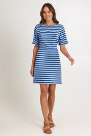 Model Madeline wearing size S of the Limon Stripe Cotton Tshirt Dress in colour Indigo (Blue), from the front, showing the whole outfit