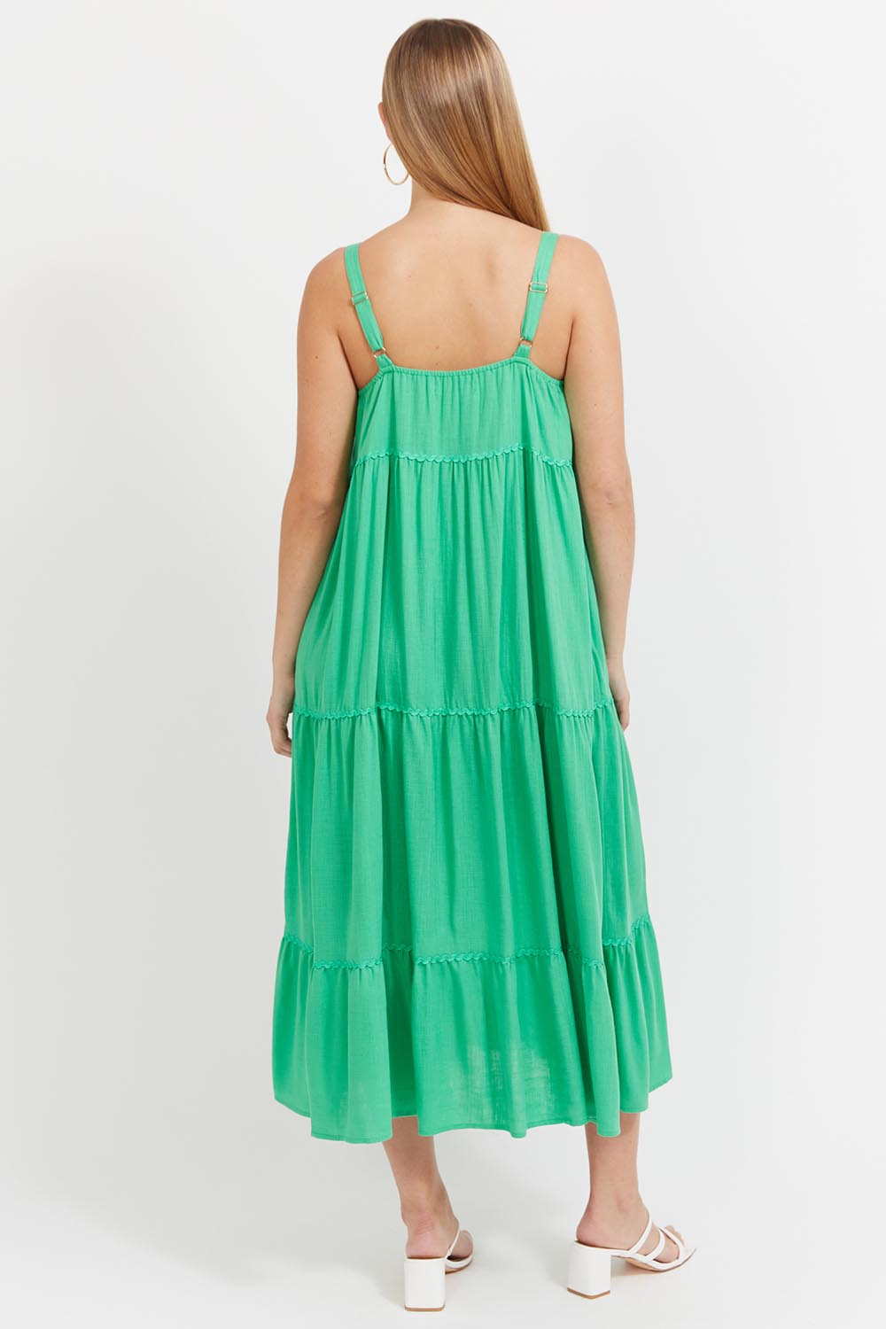 A model wearing the Haiti Tank  Maxi Dress in colour Green (Green), from the back