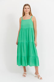 A model wearing the Haiti Tank  Maxi Dress in colour Green (Green), from the front, showing the whole outfit