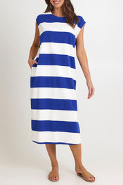 Model Madeline wearing size S of the Jardin Stripe Cotton Tshirt Dress in colour Azul (Blue), from the front, cropped image