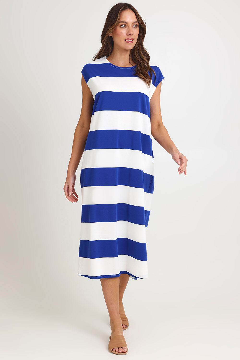 Model Madeline wearing size S of the Jardin Stripe Cotton Tshirt Dress in colour Azul (Blue), from the front, showing the whole outfit