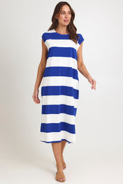 Model Madeline wearing size S of the Jardin Stripe Cotton Tshirt Dress in colour Azul (Blue), from the front, showing the whole outfit