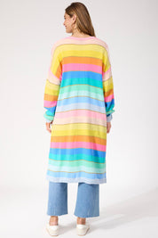 A model wearing the Niseko Cardigan in colour Pastel, from the back