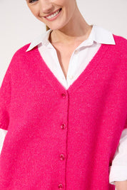 A model wearing the Valenza Knit Vest in colour Hotpink (Pink), from the front, cropped image