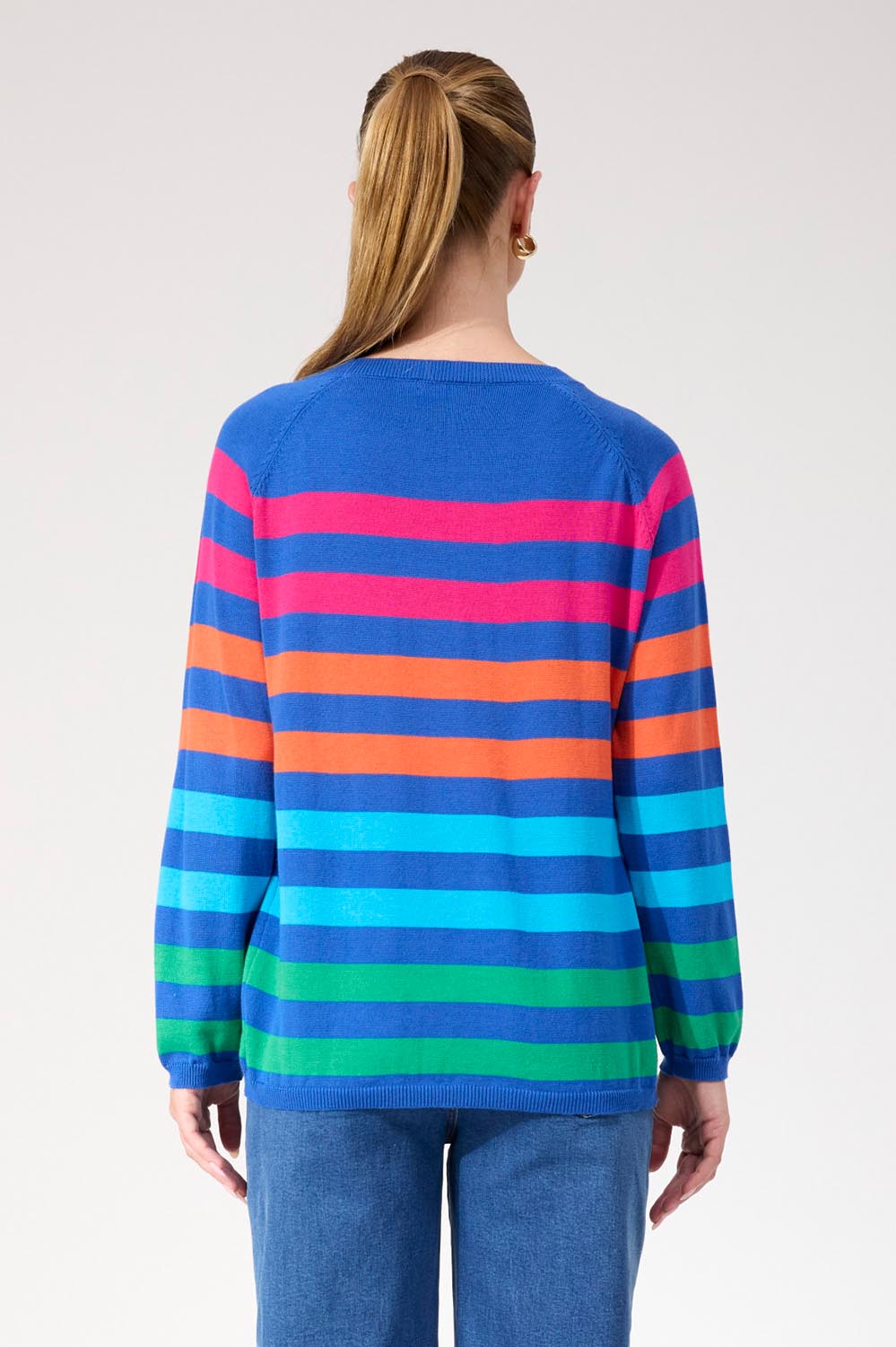 A model wearing the Vermont Stripe Jumper in colour Cobalt, from the back