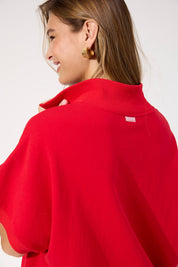 A model wearing the Boston Crop Sweat Top in colour Red (Red), from the front, cropped image