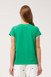 Model Genericm wearing size sample of the Congo Graphic Tee – Green in colour Green, from the back