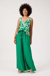 Model Genericm wearing size sample of the Kenya Palazzo Pant – Green in colour Green, from the front