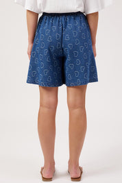 Model Genericm wearing size sample of the Sicily Heart Denim Short – Indigo in colour Indigo, from the front
