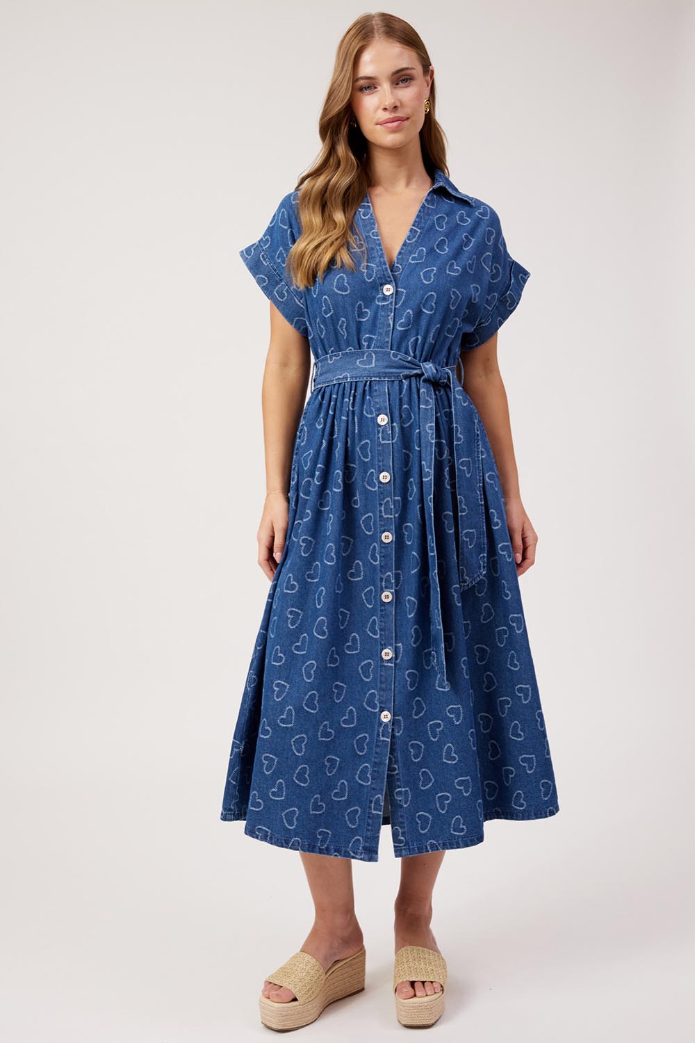 Model Genericm wearing size sample of the Sicily Heart Denim Shirt Dress – Indigo in colour Indigo, from the front