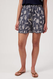 Model Genericm wearing size sample of the Crete Short – Sea in colour Sea, in a cropped view