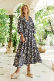 Model Genericm wearing size sample of the Crete Tiered Maxi Dress – Sea in colour Sea, from the front