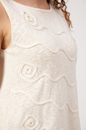 Model Genericm wearing size sample of the Olympus Applique Tank – Sand in colour Sand, from an angle