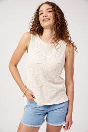 Model Genericm wearing size sample of the Olympus Applique Tank – Sand in colour Sand, in a cropped view