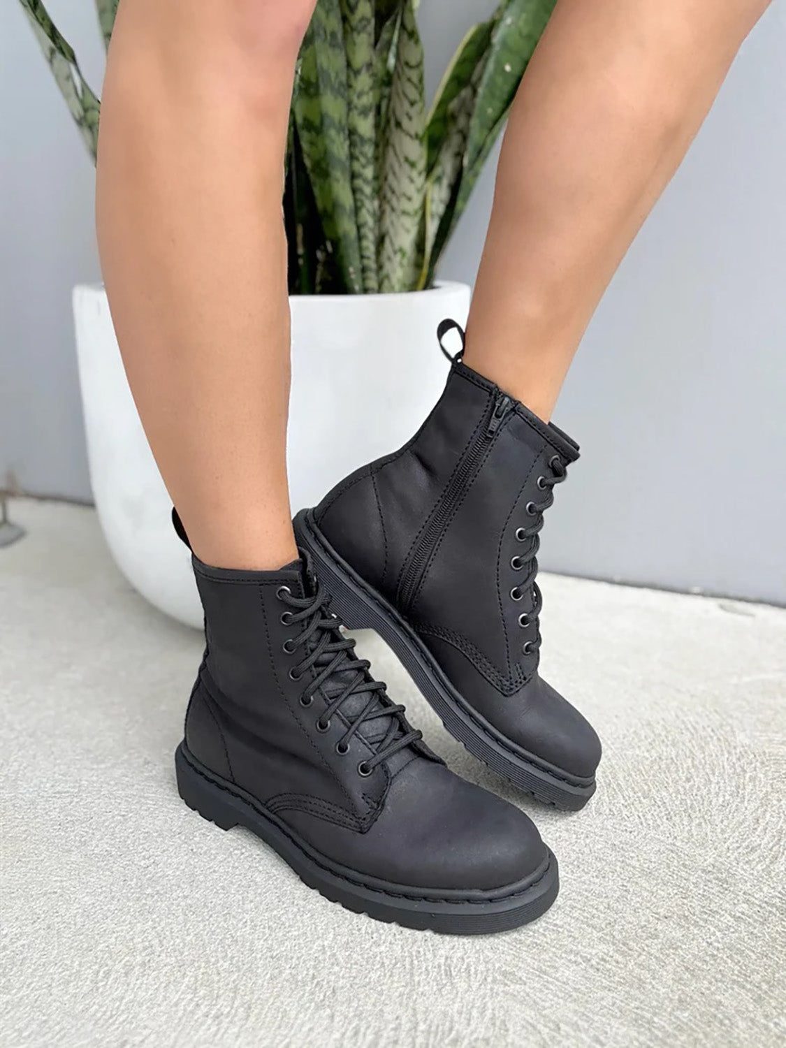 A model wearing the Porto Lace Up Leather Boot in colour Blackcrazy (Black), from the front, showing the whole outfit
