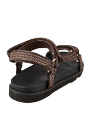 Product shot of the Reva Sandal - Chocolate in colour Chocolate, from the back