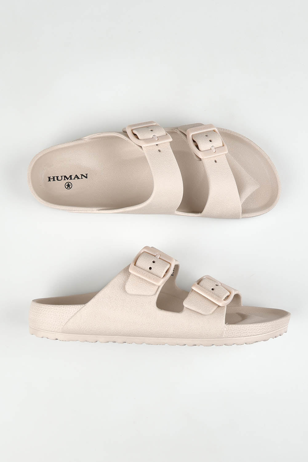 A model wearing size 37 of the Ripe Adjustable Slide in colour Coolgrey (Grey), from the front, showing the whole outfit