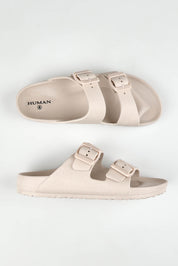 A model wearing size 37 of the Ripe Adjustable Slide in colour Coolgrey (Grey), from the front, showing the whole outfit