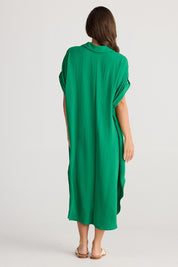 A model wearing the Canal Overshirt in colour Jade (Green), from the back