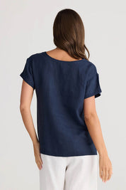 A model wearing the Captain Linen Tee in colour Navy (Blue), from the back