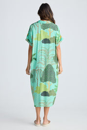 A model wearing the Canal Modal Overshirt in colour Rainforest, from the back